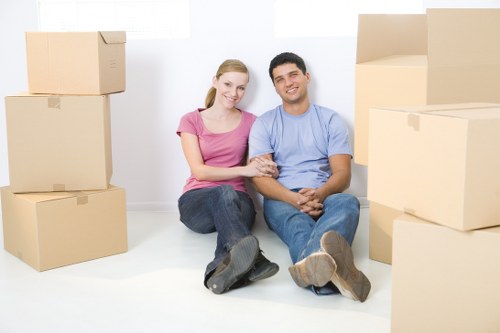 Customer moving stored items carefully in a secure unit area