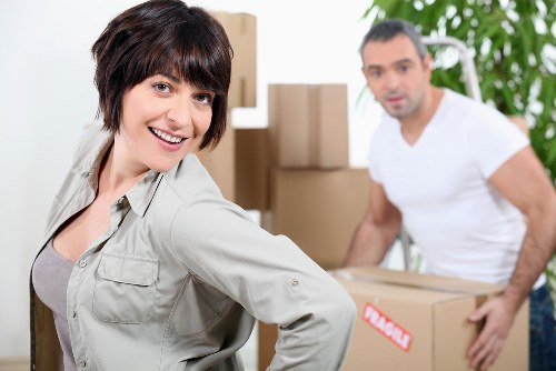 Packing boxes carefully for flat removals in Burntoak