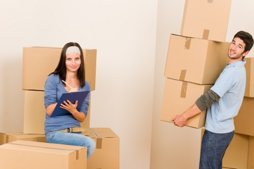 Reassembling office furniture during an office removal in Burntoak